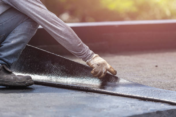 Professional Waterproofing technician working in Saint Joseph, MI